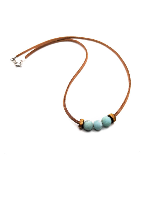 Vegan leather handmade necklace with three Amazonite beads with coconut shell space beads on the outside of the amazonite beads